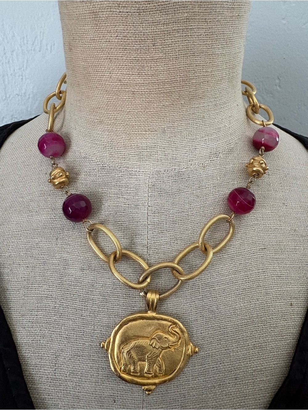 Gold-Tone Elephant Pendant Necklace with Purple Bead Accents
